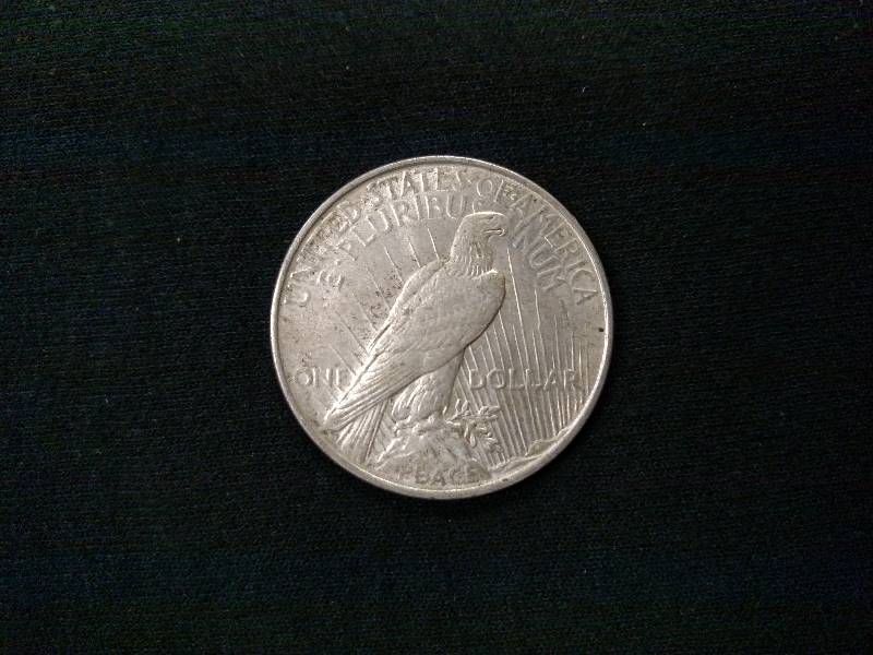lot 56 image: 1923 D Peace Silver Dollar...