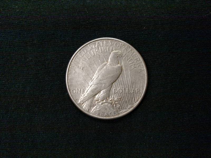 lot 58 image: 1923 S Peace Silver Dollar...