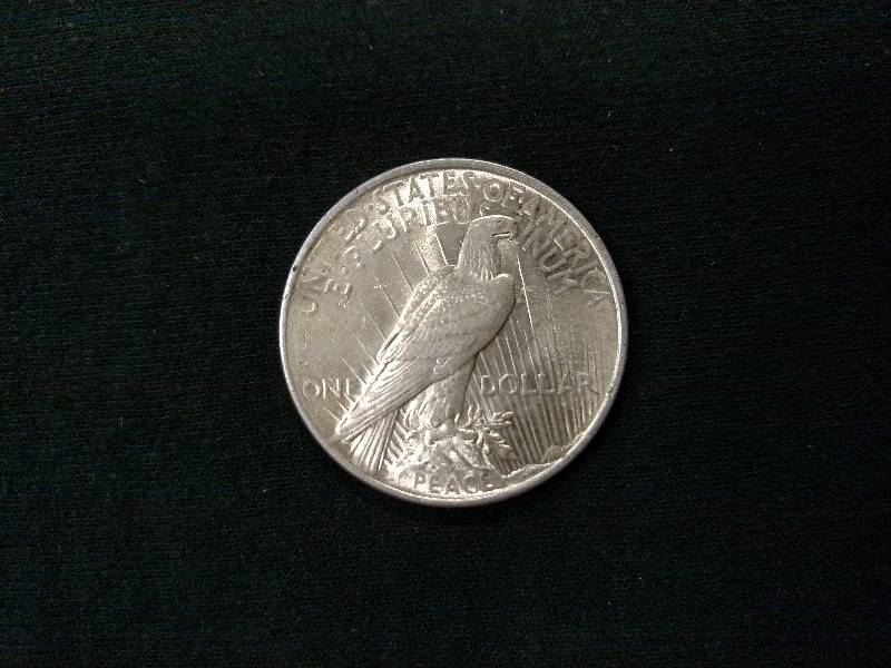 lot 59 image: 1924 Peace Silver Dollar...