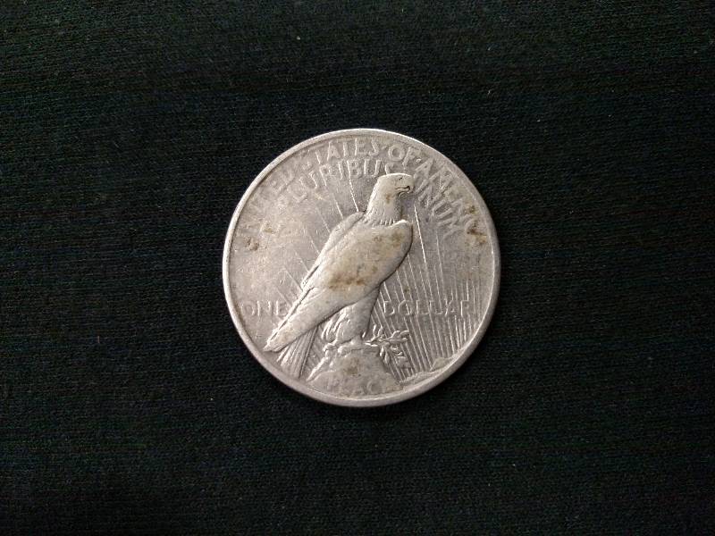 lot 60 image: 1924 Peace Silver Dollar...