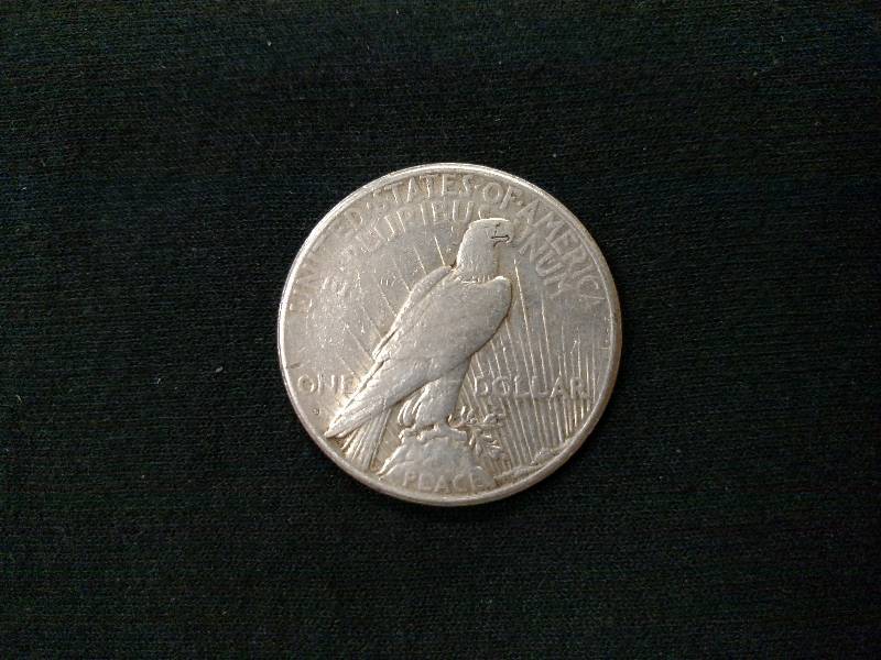 lot 63 image: 1925 S Peace Silver Dollar...