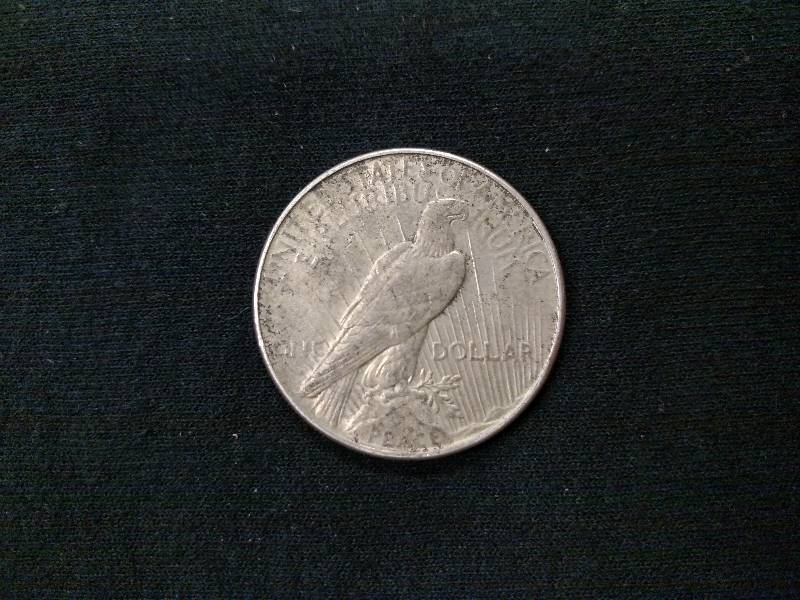 lot 68 image: 1934 Peace Silver Dollar...
