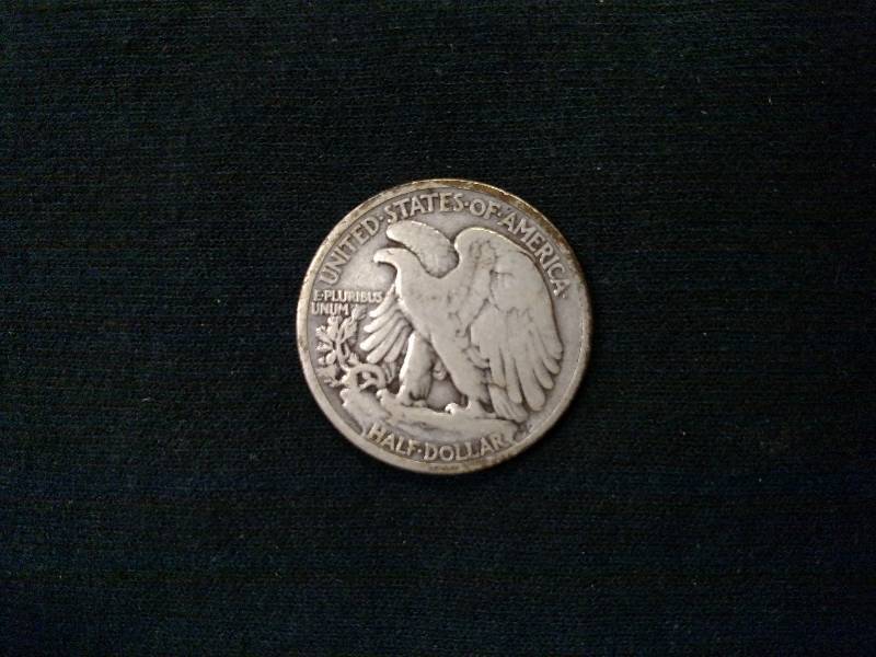 lot 95 image: 1934 Walking Liberty Silver Half Do...