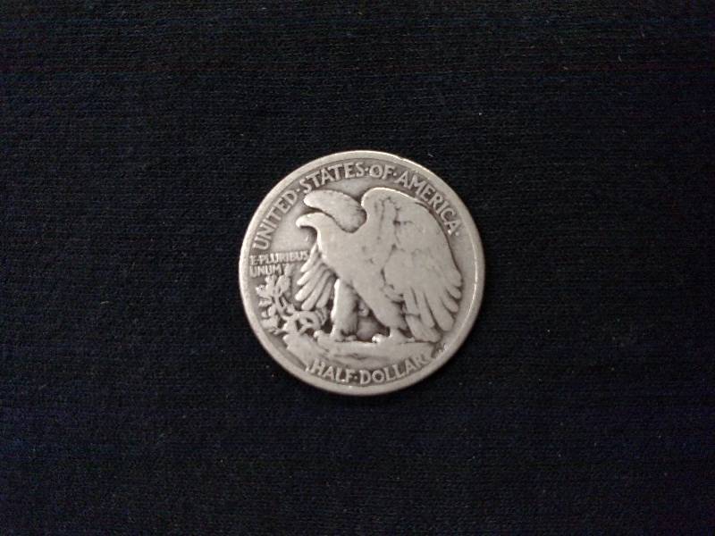 lot 97 image: 1935 Walking Liberty Silver Half Do...