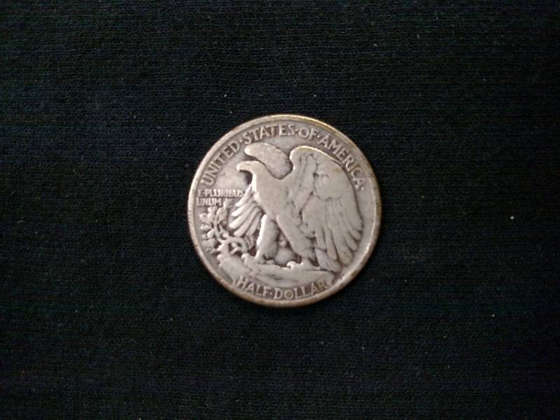lot 107 image: 1940 Walking Liberty Silver Half Do...