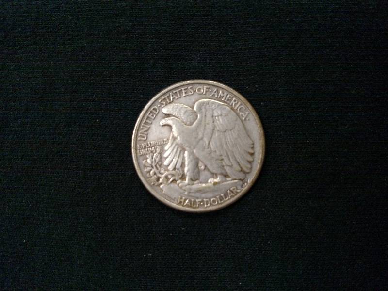 lot 115 image: 1944 Walking Liberty Silver Half Do...