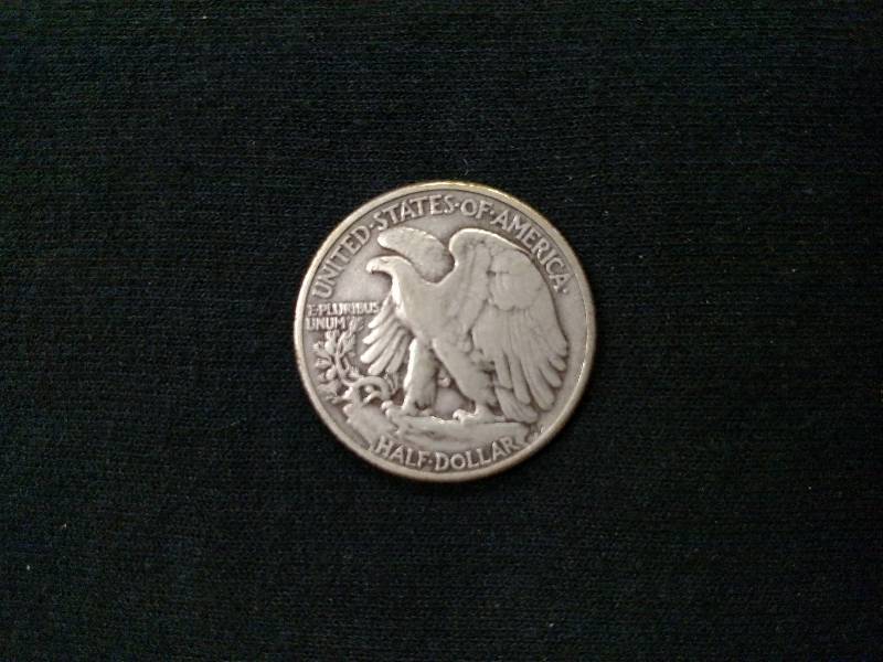 lot 121 image: 1946 Walking Liberty Silver Half Do...
