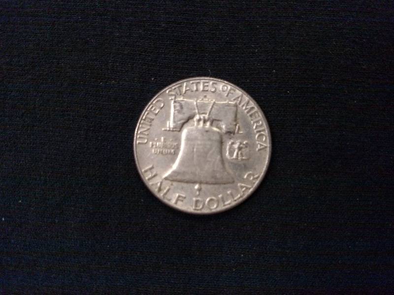 lot 128 image: 1961 D Franklin Silver Half Dollar...