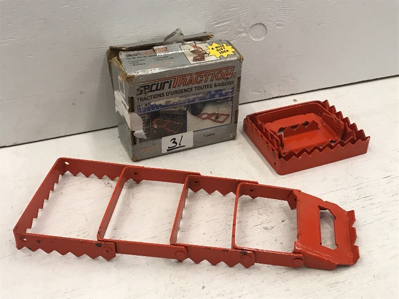lot 31 image: 2-Piece Securi-Traction Tire Tracti...