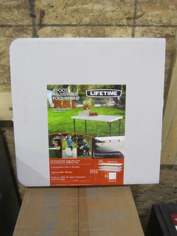 lot 61 image: Lifetime 4 ft. Almond Adjustable Height Fold-in-Half Table