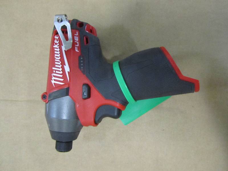 lot 64 image: Milwaukee M12 Fuel 12-Volt Lithium-Ion Brushless 14 in. Hex Impact Driver (Tool-Only)