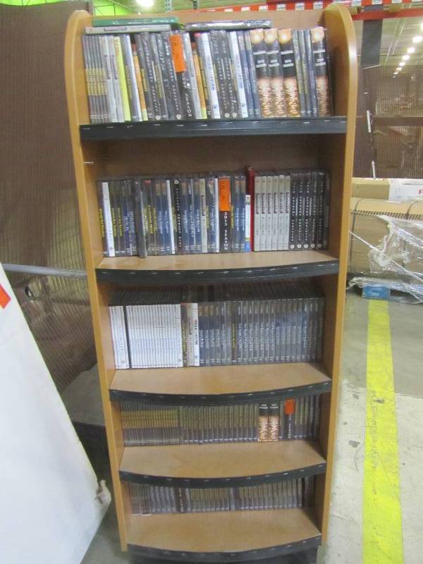 lot 92 image: bookshelf with videos