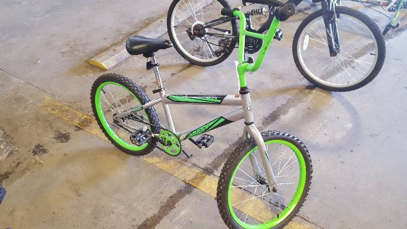 lot 409 image: Huffy Rock It   Bike with GreenSilver 10in. Frame, 16in. Wheel