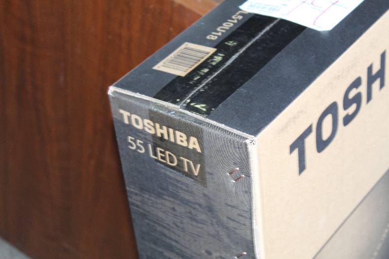 lot 12 image: Toshiba 55in. LED Flat Screen TV