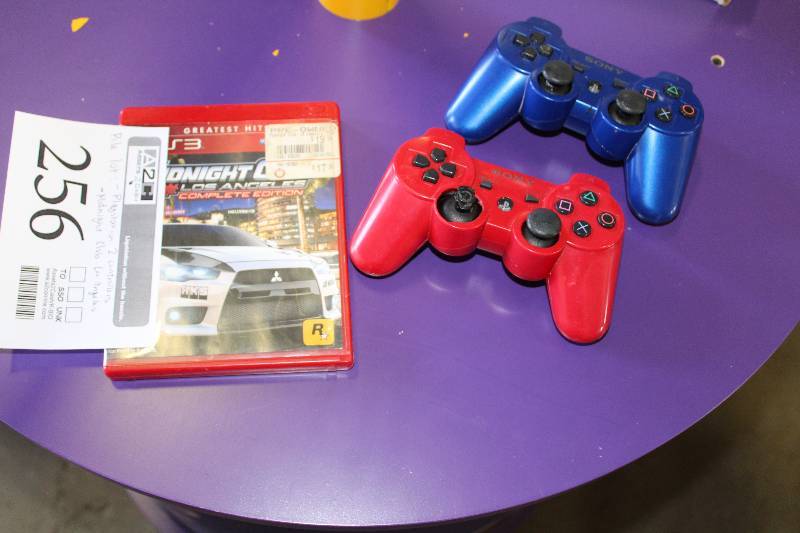 lot 256 image: Lot of (3) Game components - 2) Playstation 2 Controllers, 1) Midnight Club LA Game