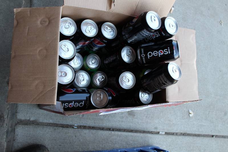 lot 319 image: 12oz. Cans Pepsi, Diet Mug root Beer
