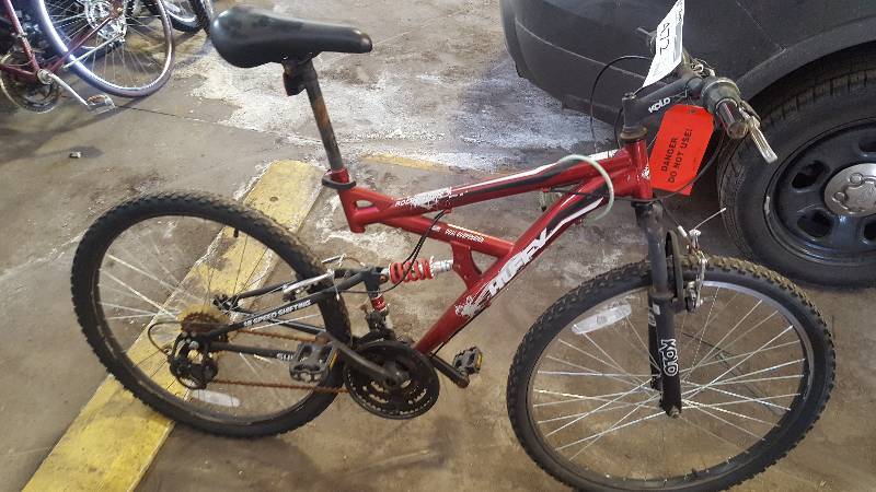 lot 472 image: Huffy Rick Freak 18-Speed Rock Bike with Red 17in. Frame, 22.5in. Wheel