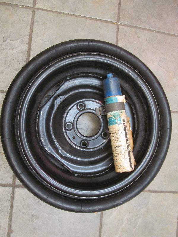 lot 108 image: new GMC spare tire