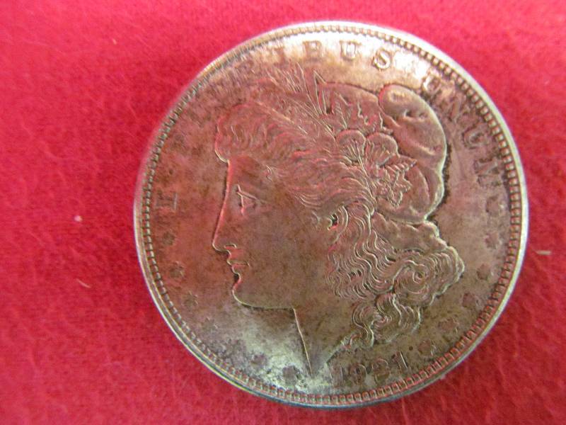 lot 120 image: Morgan silver dollar