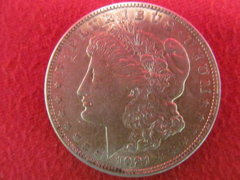lot 121 image: Morgan silver dollar