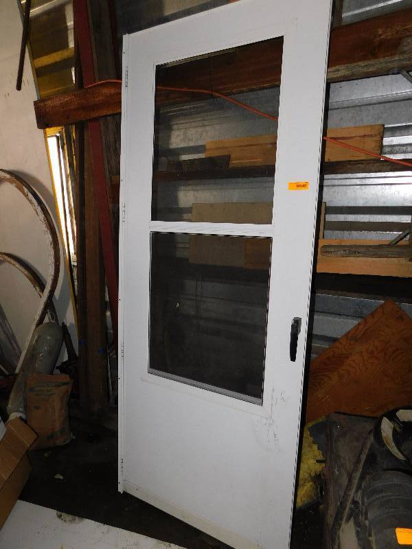lot 328 image: EXTERIOR STORM DOOR