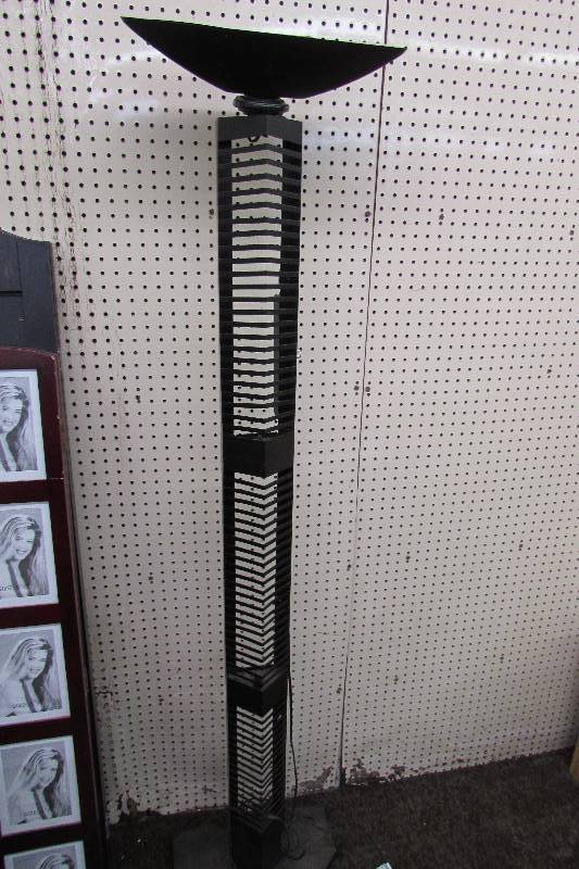 FLOOR LAMP  CD HOLDER. LAMP LOOSE AT THE TOP, NEEDS TO BE TIGHTENED UP