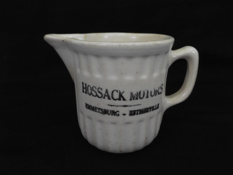 lot 32 image: Antique Hossack Motors Advertising Ceramic Oil PitcherMug