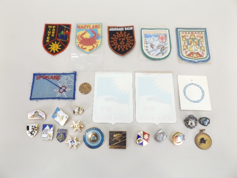 lot 46 image: Lot of Vintage Skiing Medals, Pins, and Patches