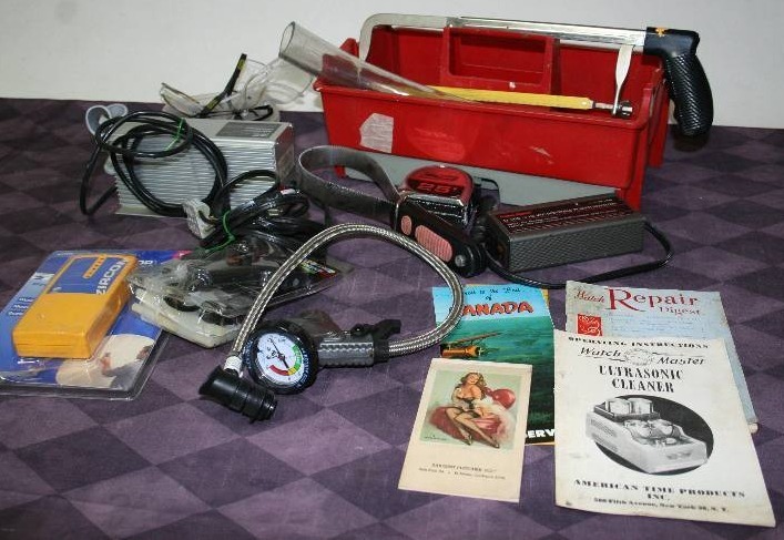 lot 74 image: Hand Tools, Battery Charger, and More
