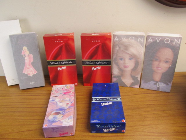 lot 32 image: Lot of 7 NEW IN BOX Limited Edition Avon Barbies