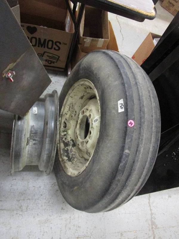 lot 14 image: Tire and Extra Rim to Match Tractor