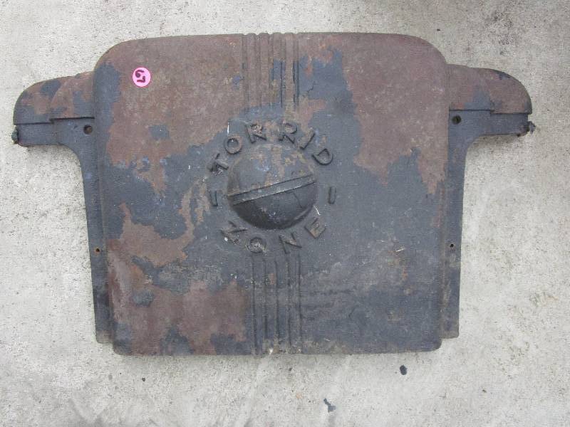 lot 67 image: Vintage Torrid Zone Cast Iron Stove Piece