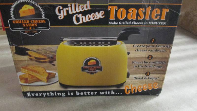 lot 20 image: Grilled Cheese Toaster open box, un...