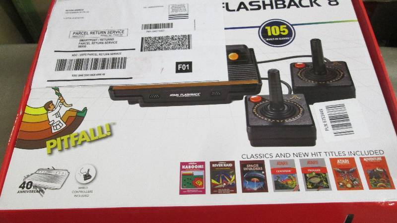 lot 82 image: Flashback 8 by Atari open box, unte...