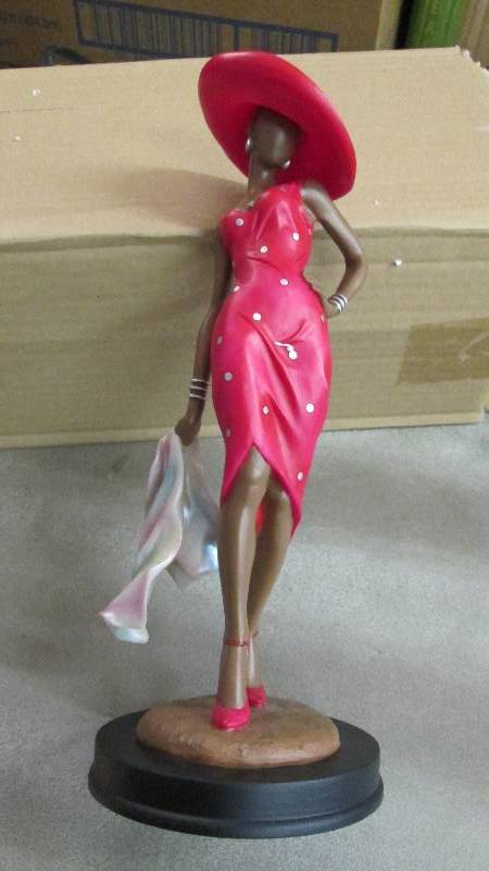 lot 96 image: Sassy in Red Figurine Retail $29.99...