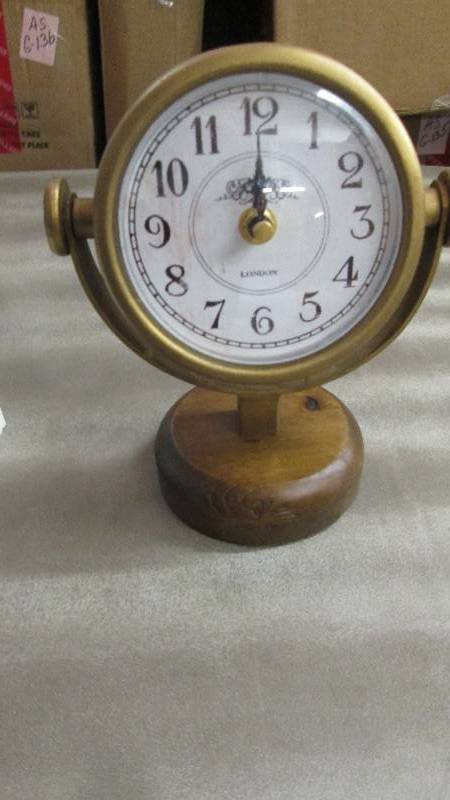 lot 113 image: Table Clock Retail $29.99...