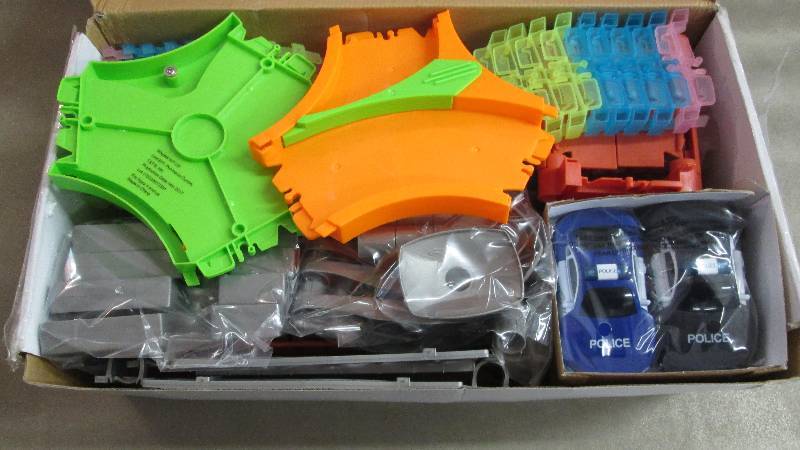 lot 117 image: Police Car Race Track open box Reta...