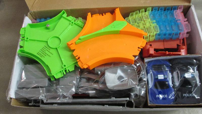 lot 118 image: Police Car Race Track open box Reta...