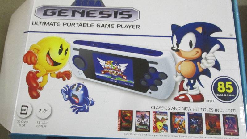 lot 129 image: Genesis Portable Game Player Retail...