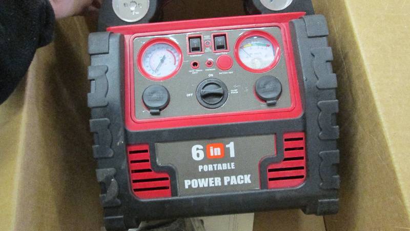 lot 285 image: 6-In-1 Portable Power Source open b...