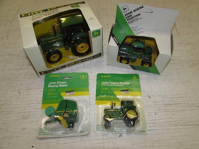 lot 385 image: JOHN DEERE COLLECTIBLE TOY TRACTORS AND BALER