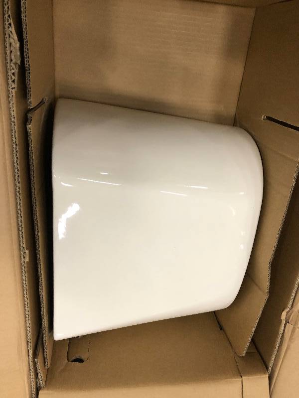 Glacier Bay 2-piece 1.28 GPF High Efficiency Single Flush Elongated Toilet in Biscuit not used