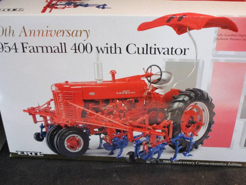 lot 14 image: 50th Anniversary 1954 Farmall 400 With Cultivator by ERTL