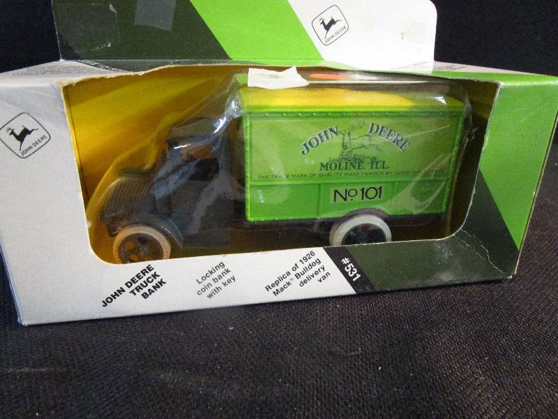 lot 28 image: John Deere #101 Truck Bank 125 Scale by ERTL #531