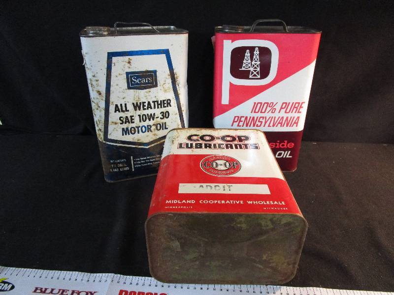 lot 37 image: Three Vintage Oil Cans Montomery Wards, Coop Lubricants, and Sears