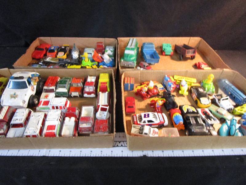 lot 64 image: 4 boxes of cars