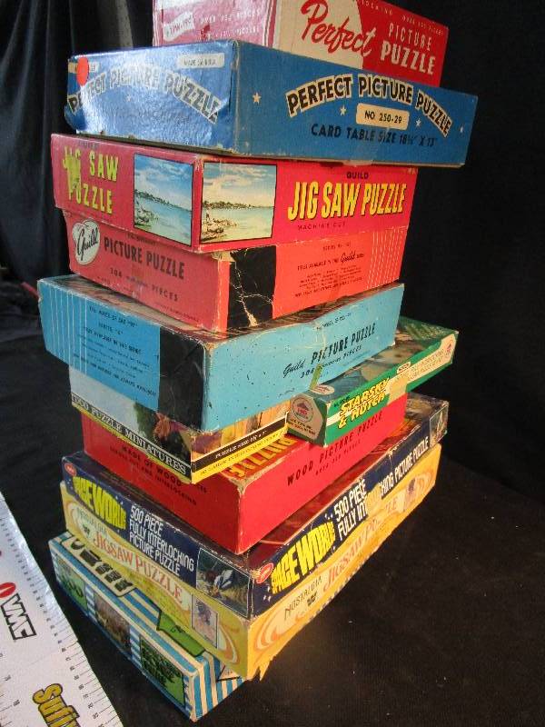 lot 100 image: 11 Puzzels