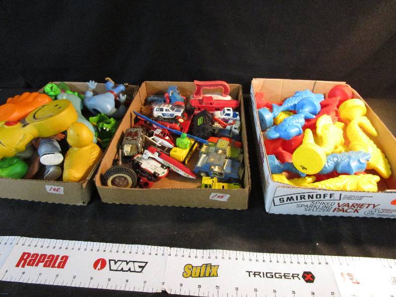 lot 105 image: 3 Flats of misc small toys