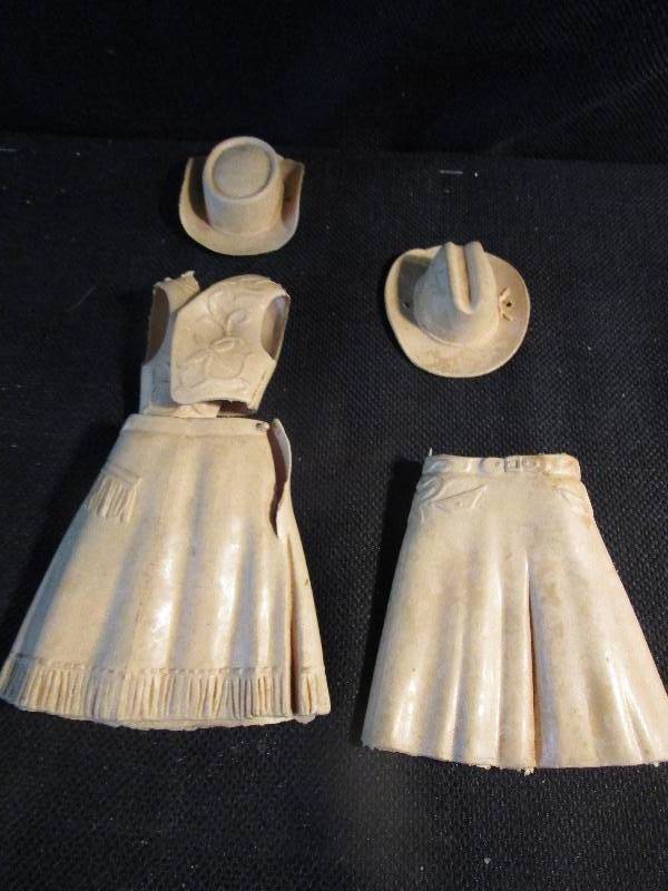 lot 156 image: Jane West Clothes