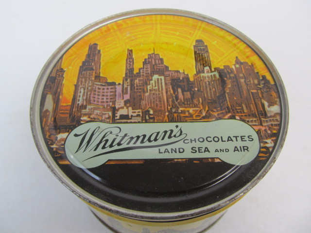 lot 32 image: Vintage 1940s Whitmans LAND SEA & AIR Chocolates Tin